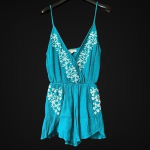 Onetheland brand teal with white floral embroidery